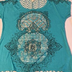 La mamba top with gold Aztec design. Size medium